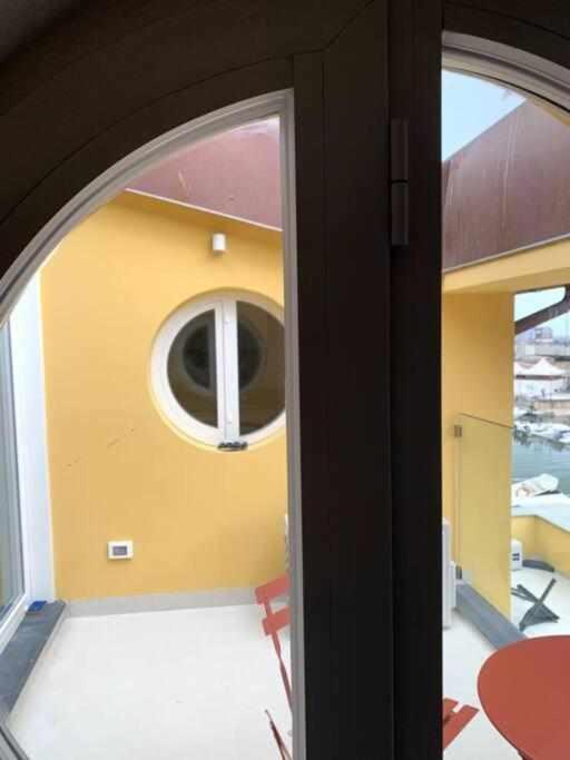 Waterfront Balcony I Grani 4 Resort Style Suite Livorno Bagian luar foto